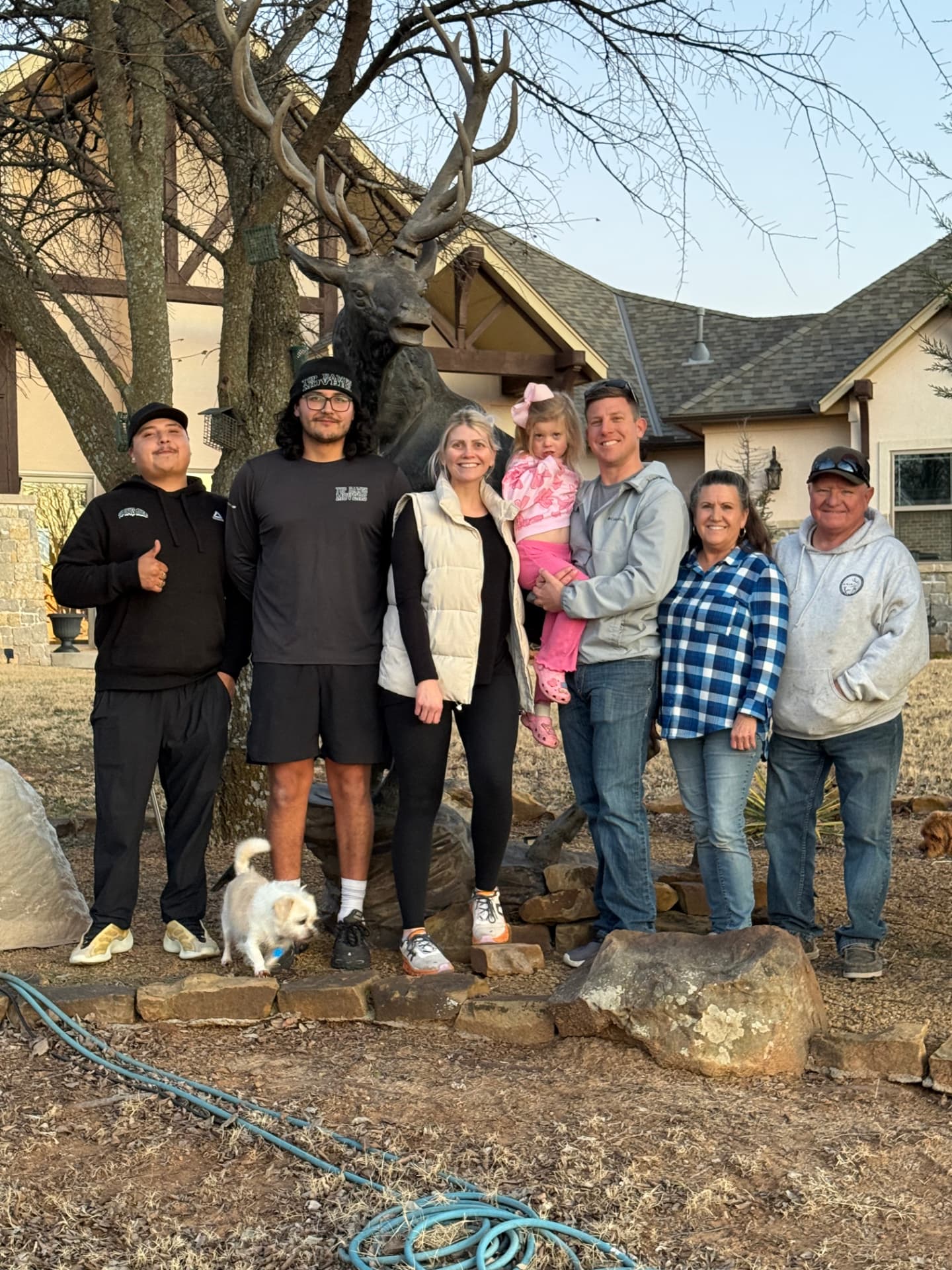 Top Dawg Movers crew with a happy Oklahoma family after a completed move